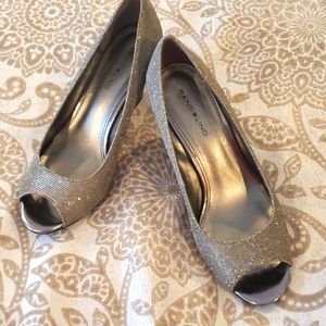 Brand New condition. Bandolino silver wedge heels. Sz 7